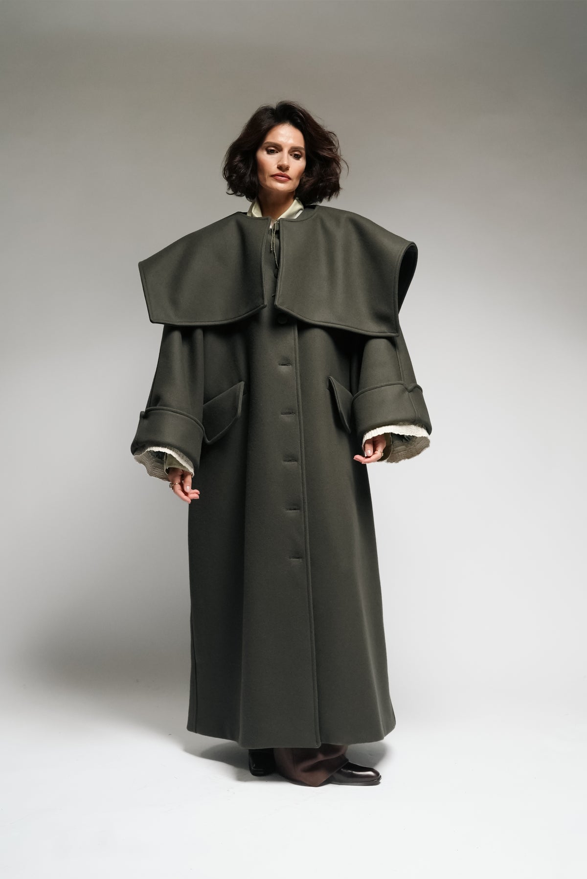 Between Worlds. The coat.