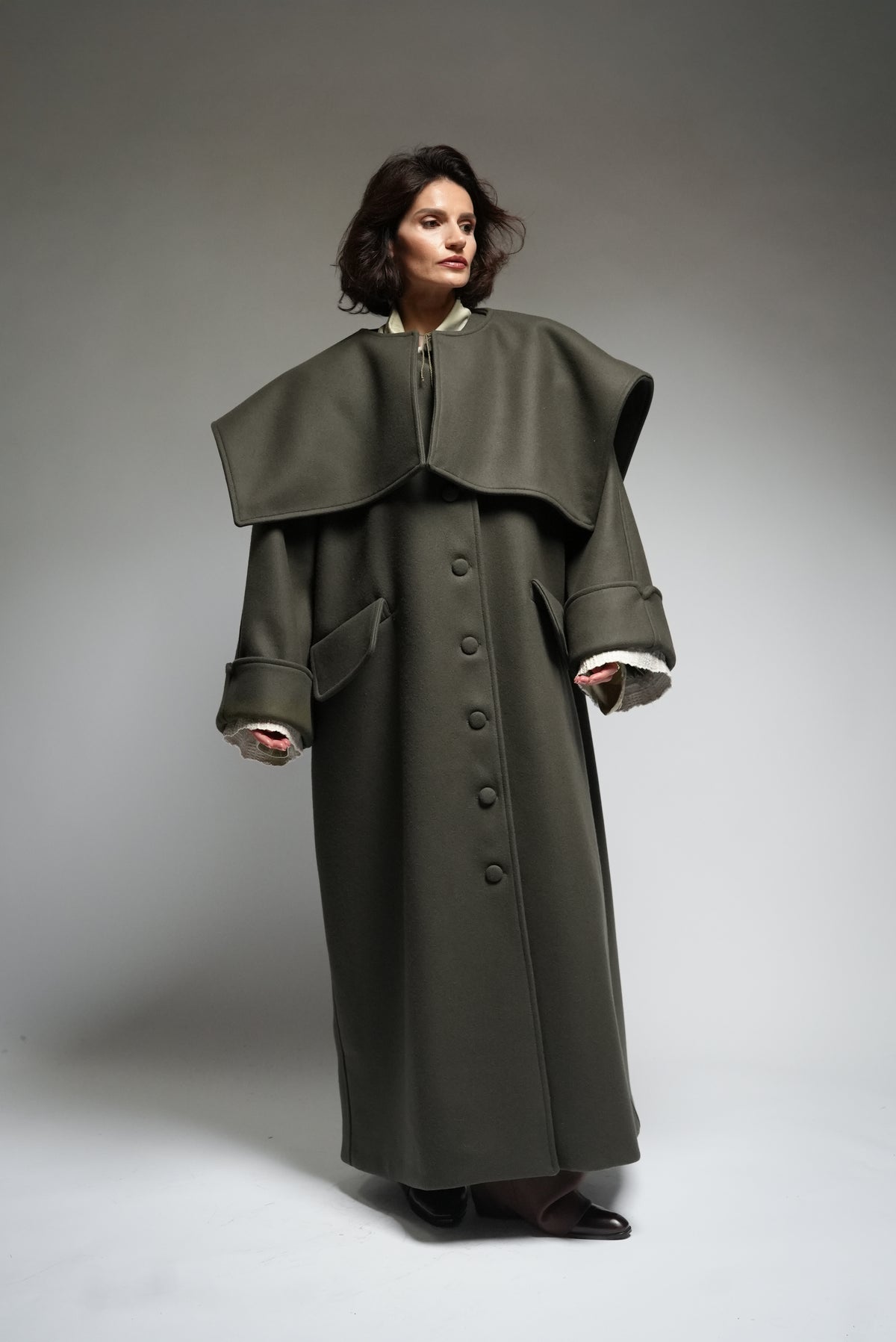Between Worlds. The coat.