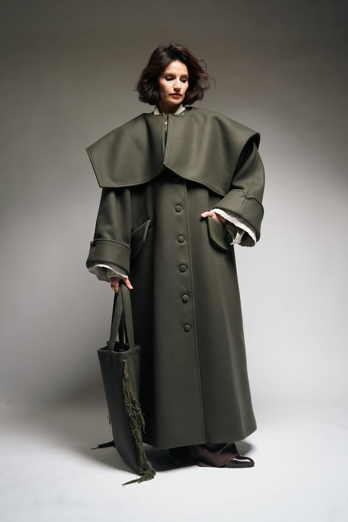 Between Worlds. The coat.