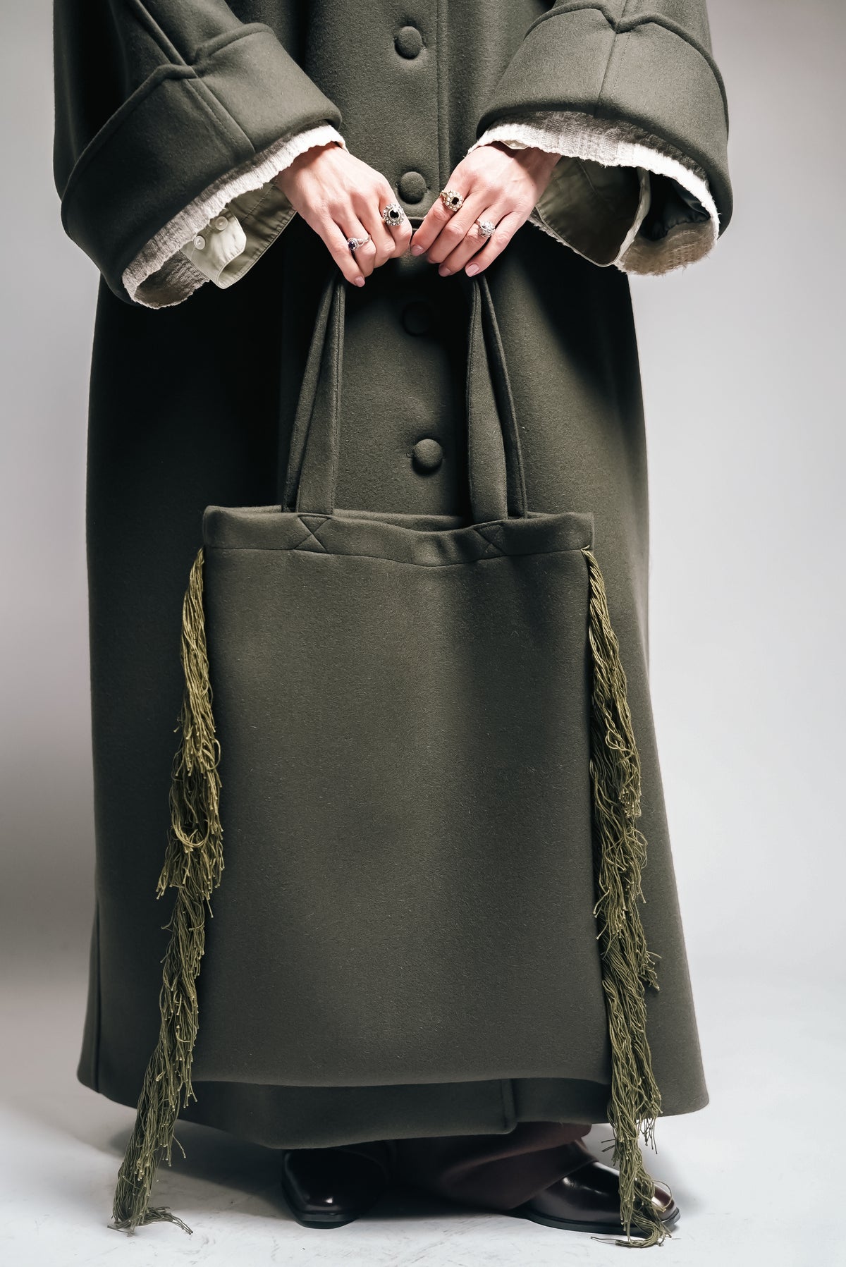 Between Worlds. The coat.