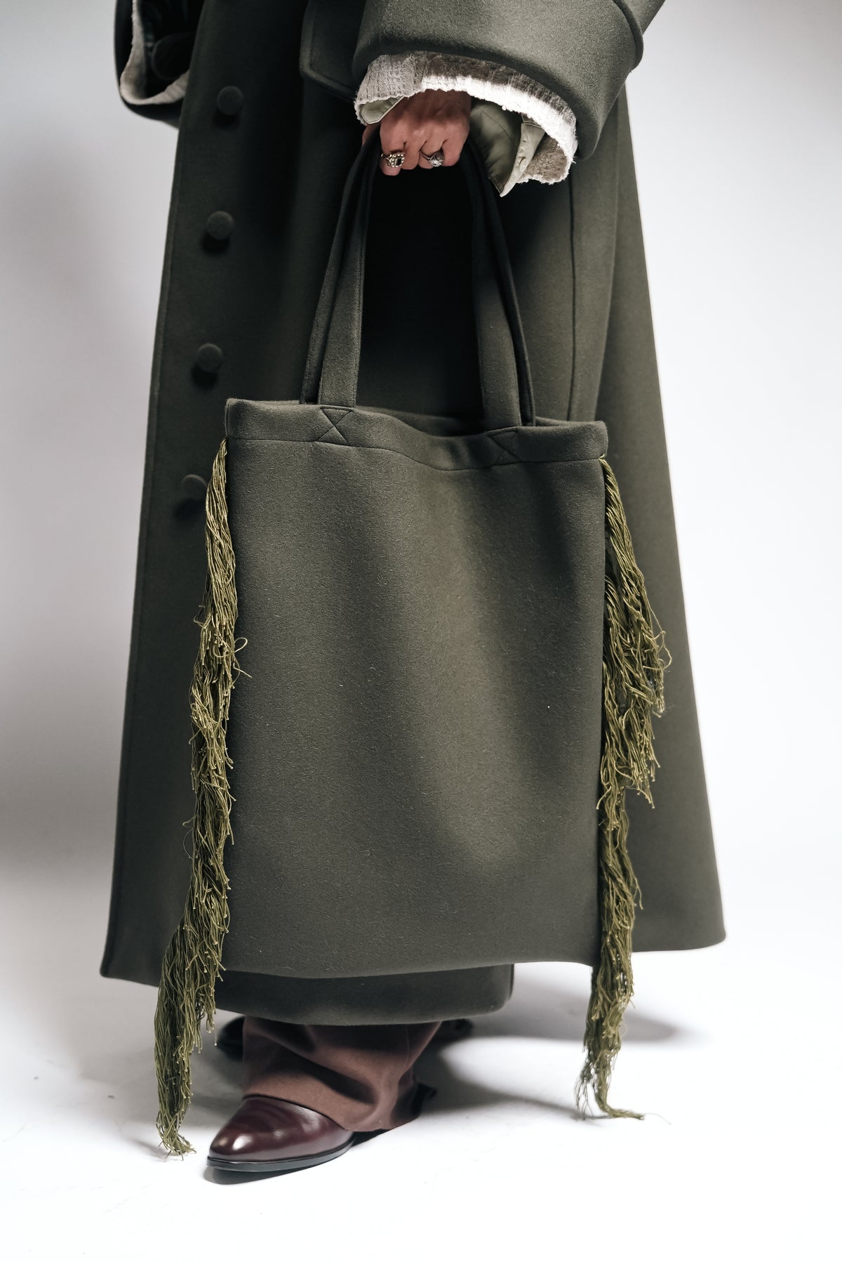 Between Worlds. The coat.