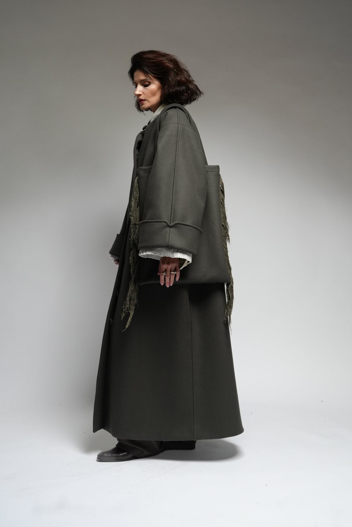Between Worlds. The coat.