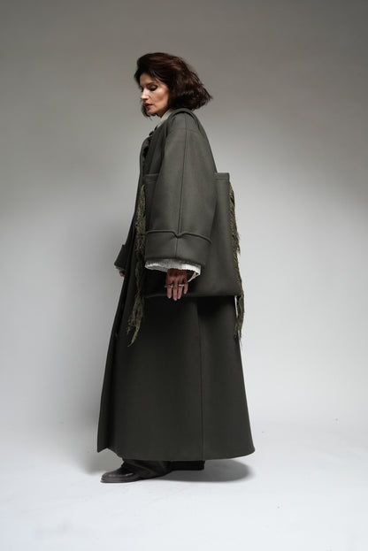 Between Worlds. The coat.