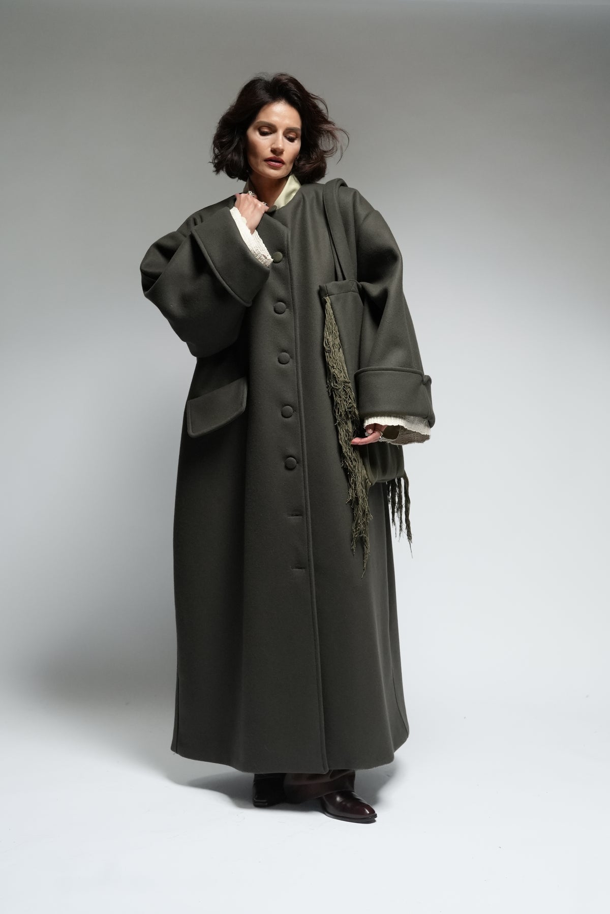 Between Worlds. The coat.