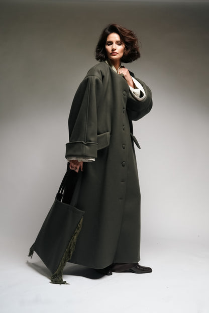 Between Worlds. The coat.