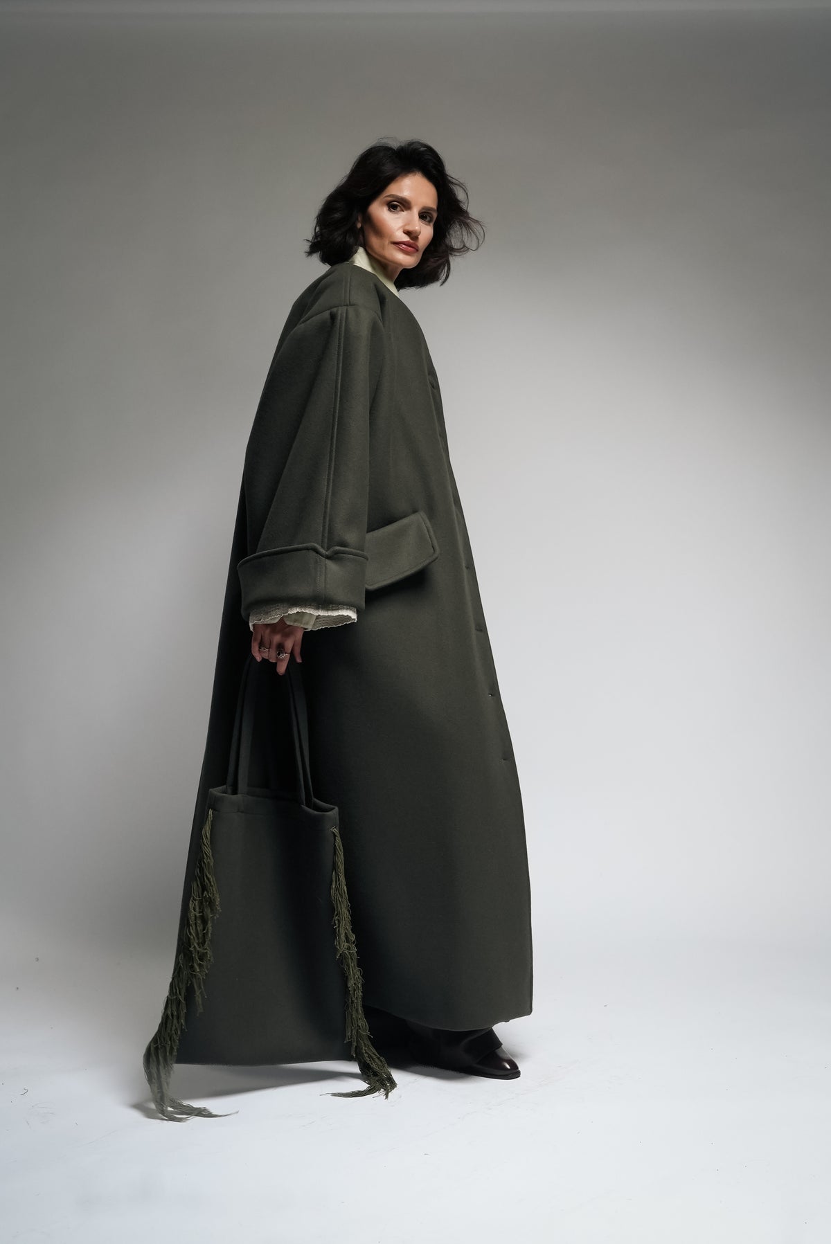 Between Worlds. The coat.