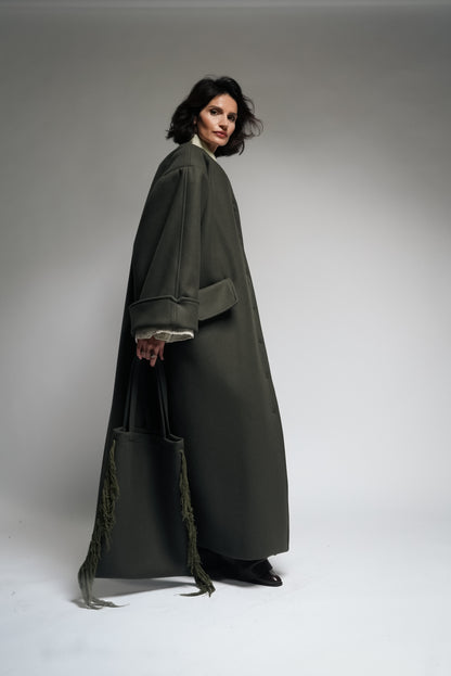 Between Worlds. The coat.