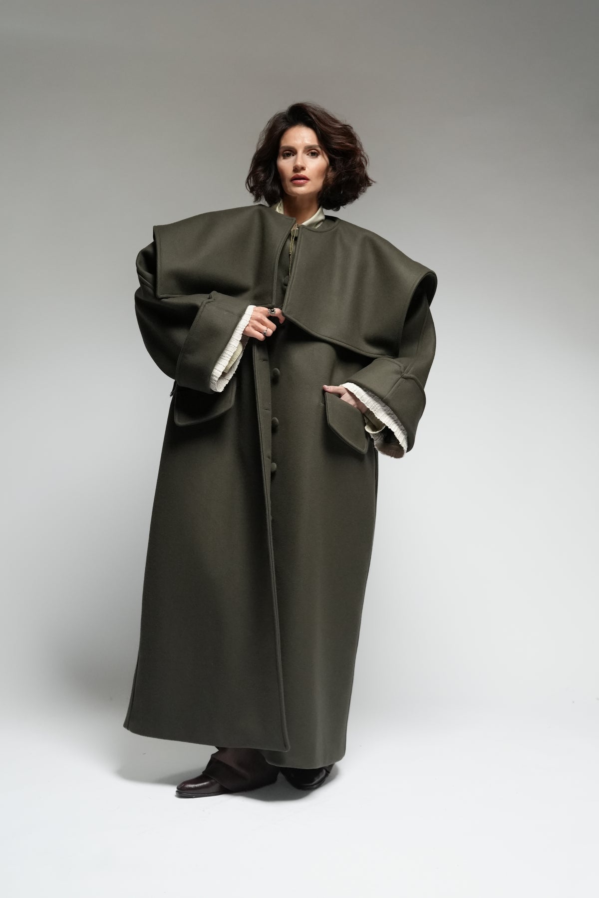 Between Worlds. The coat.