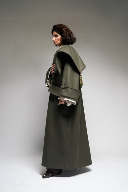 Between Worlds. The coat.