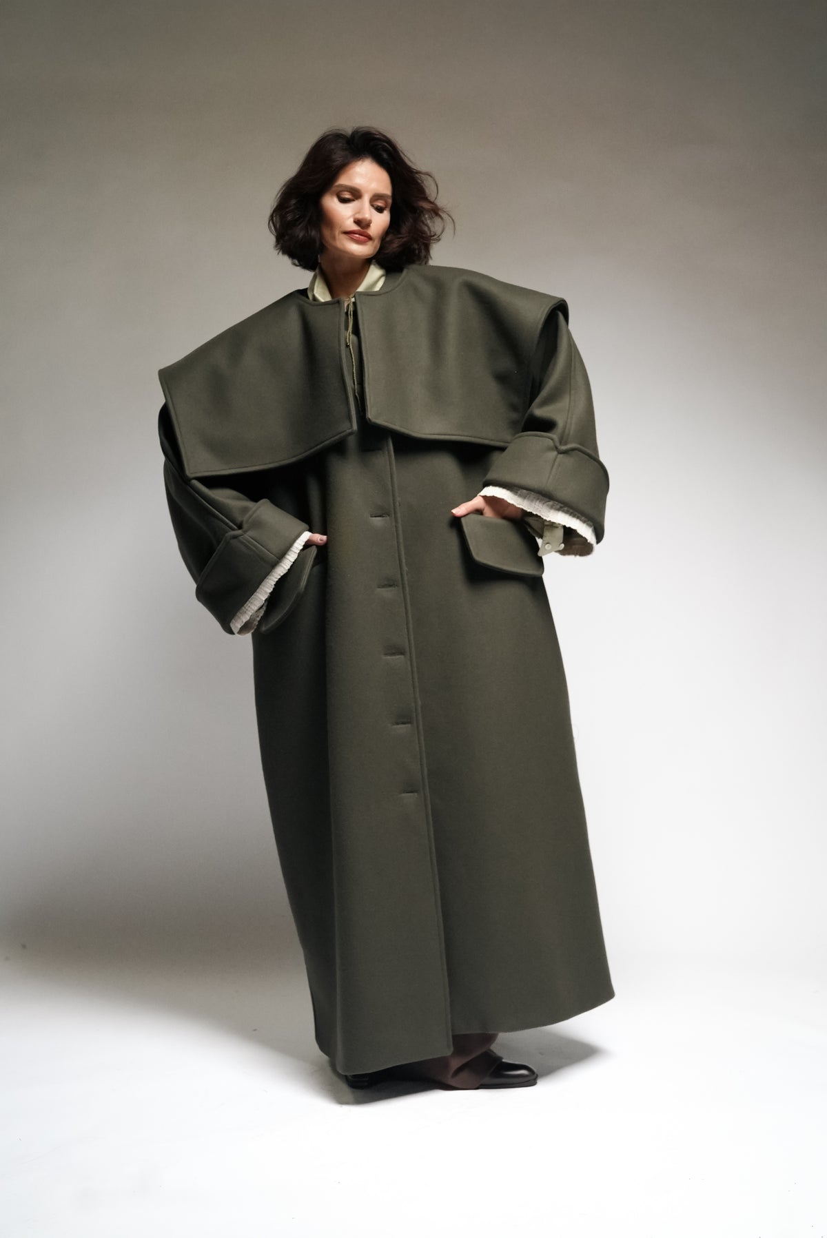 Between Worlds. The coat.