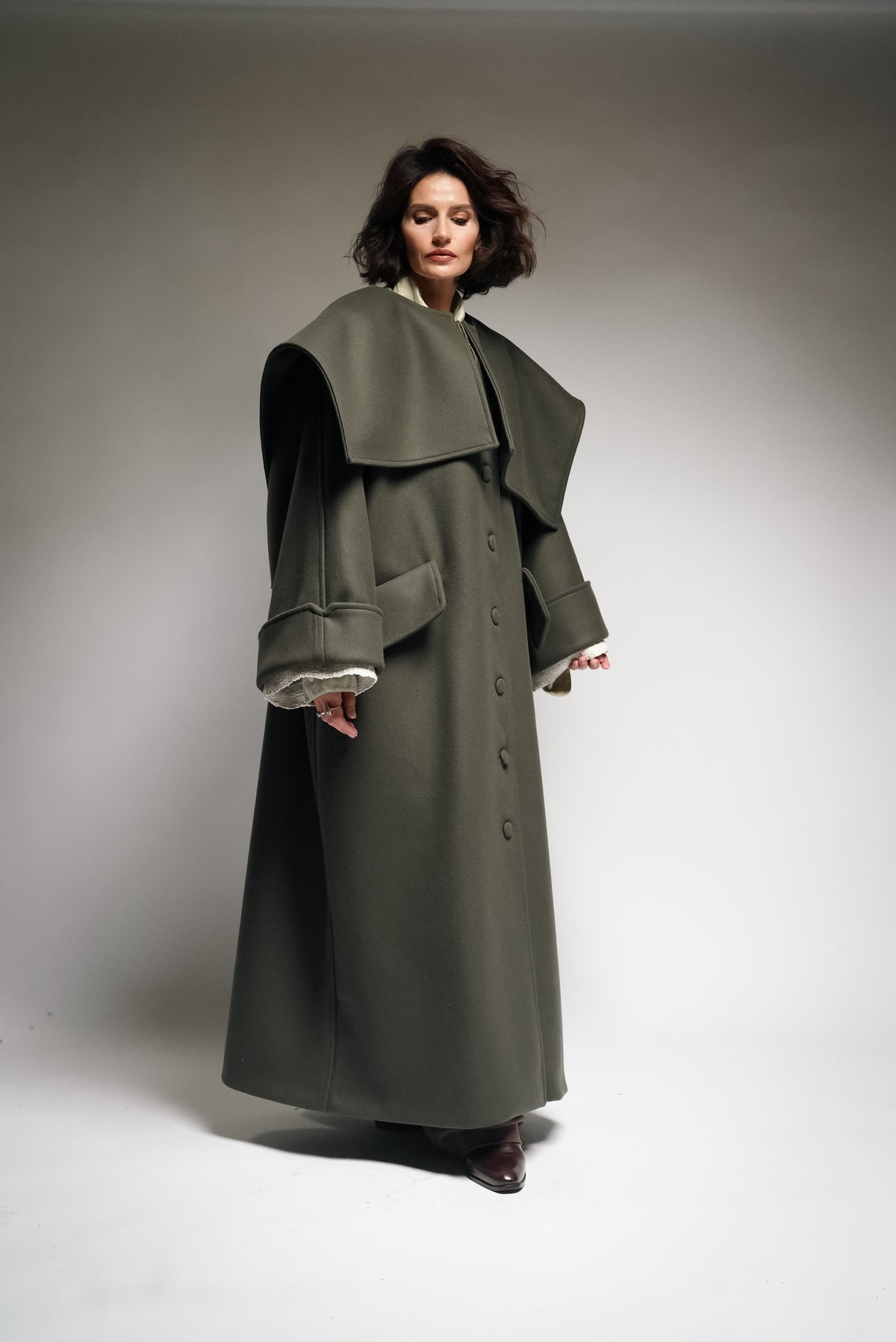 Between Worlds. The coat.