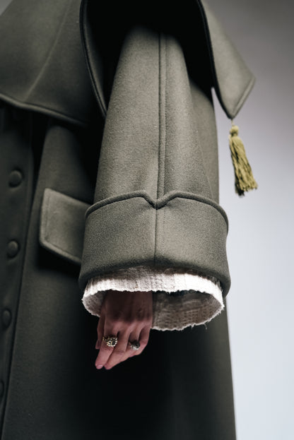 Between Worlds. The coat.