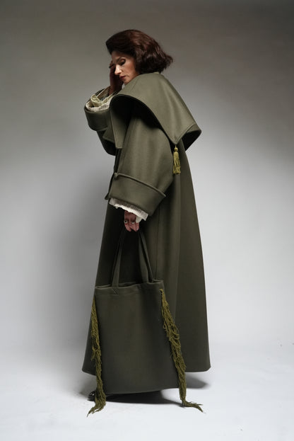 Between Worlds. The coat.