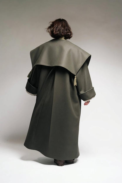 Between Worlds. The coat.